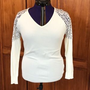 L Venus brand sweater with lace detail